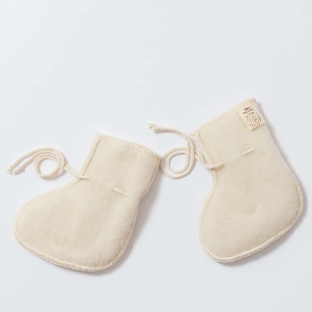 Chaussons de naissance en laine mérinos bio écru Lana Care