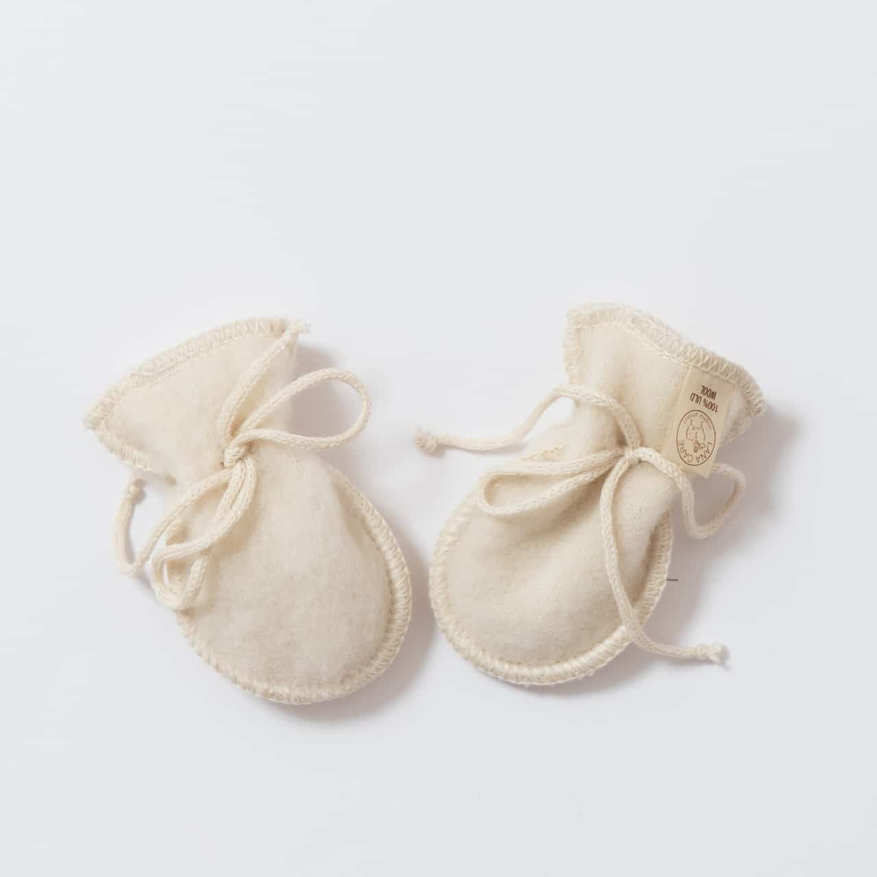 Moufles bébé en laine mérinos bio écru Lana Care