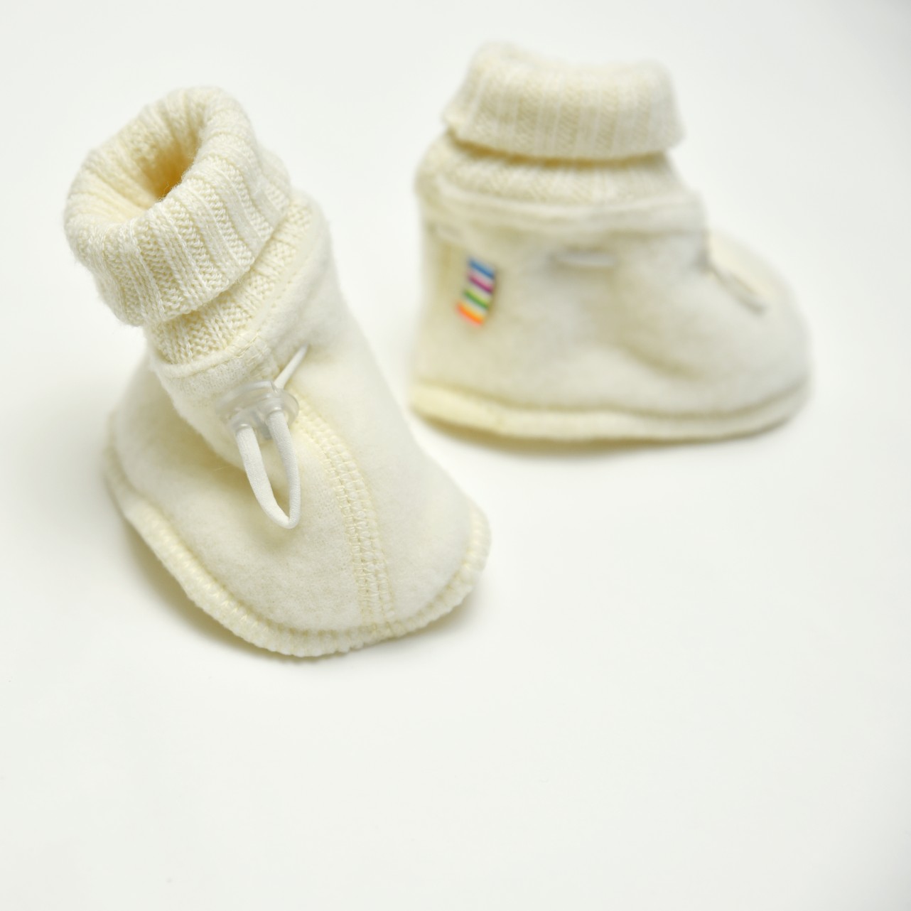 Chaussons bébé en laine mérinos - écru<br/> <FONT face="Tunga" size=4>Joha</font>