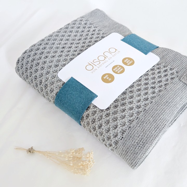 Couverture bébé Disana en laine mérinos maille nid d'abeille grise